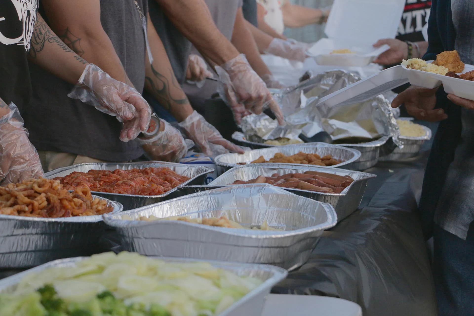 Volunteers packing meals for an Ihsan Initiative distribution